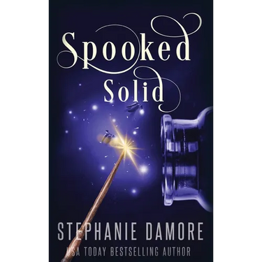 Spooked Solid: A Paranormal Cozy Mystery
