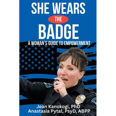 She Wears The Badge: A Woman's Guide to Empowerment