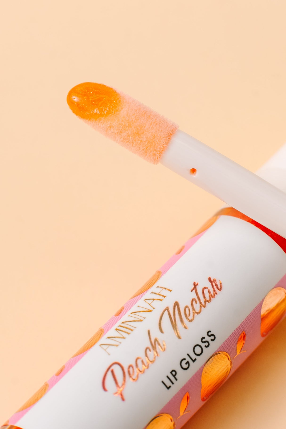 Peach Nectar Lip Gloss by AMINNAH