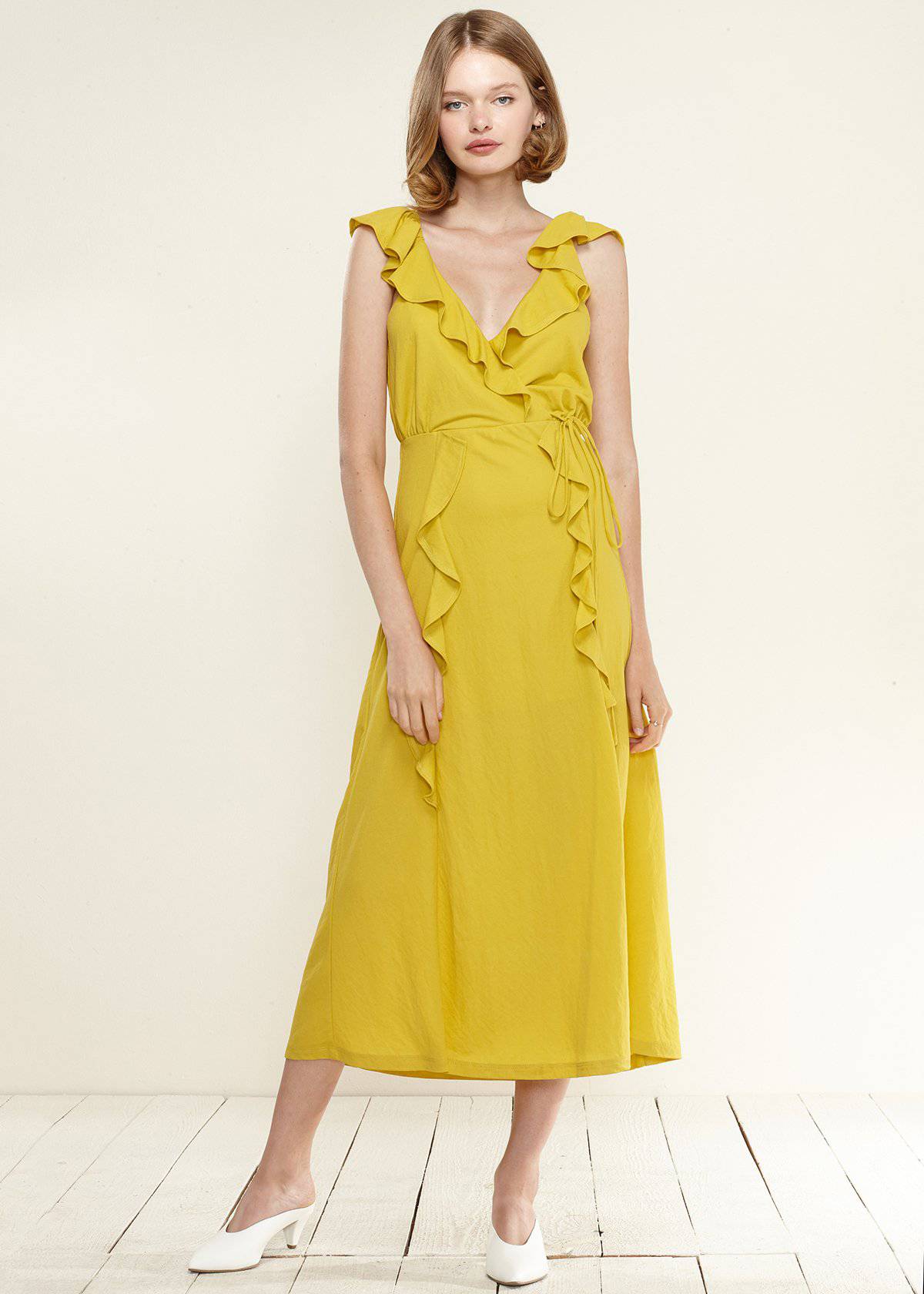 Women's Ruffle Trim Wrapped Maxi Dress in Mustard by Shop at Konus