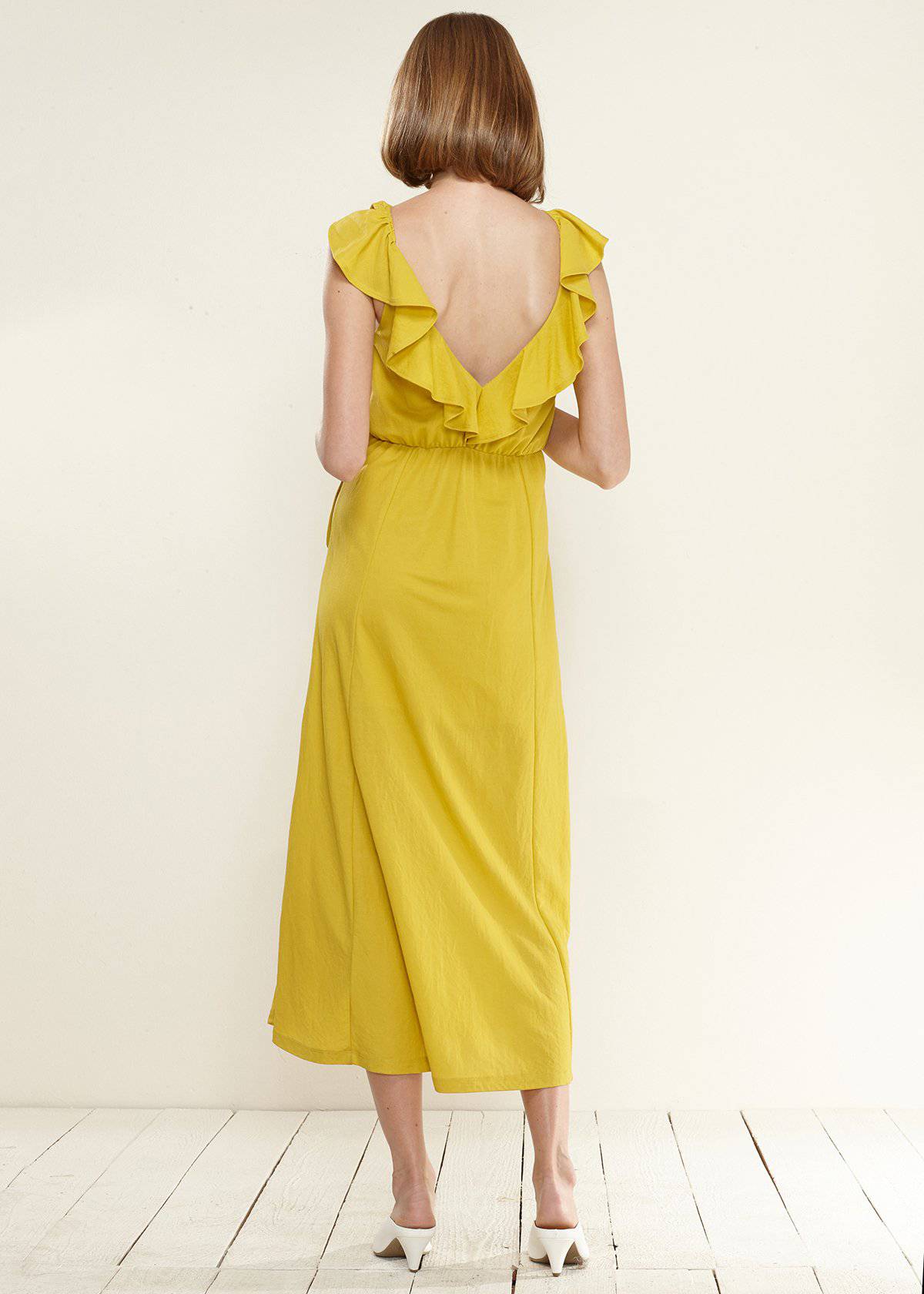 Women's Ruffle Trim Wrapped Maxi Dress in Mustard by Shop at Konus