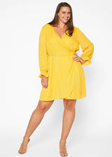 Plus Size Smocked Bell Sleeve Wrap Dress in Yellow by Shop at Konus