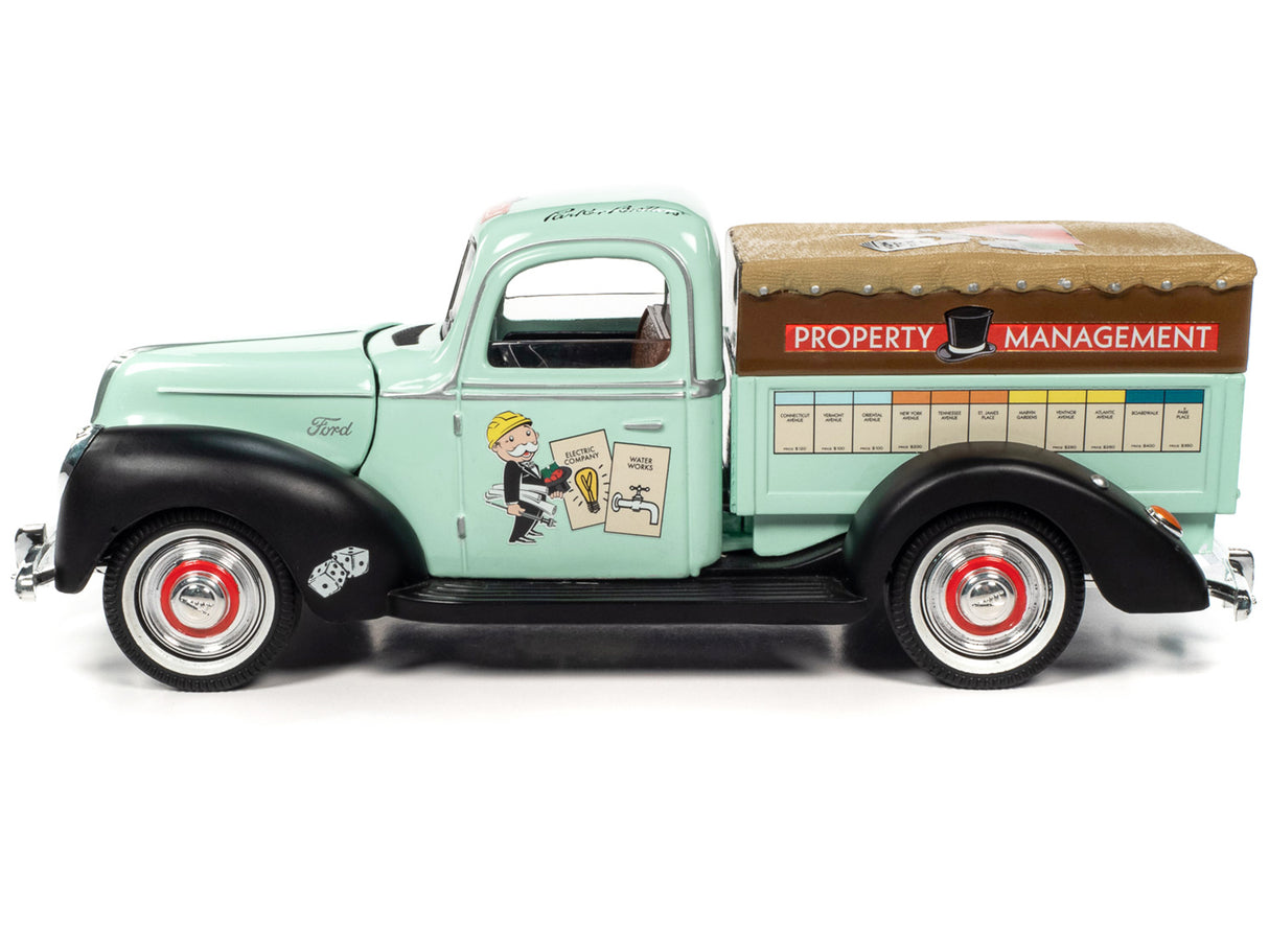 1940 Ford Pickup Truck "Property Management" Light Green with Graphics and Mr. Monopoly Construction Resin Figure "Monopoly" 1/18 Diecast Model Car by Auto World