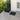 12 x 12 inch black interlocking deck tiles, plastic waterproofing, pebble pattern, pack of 12