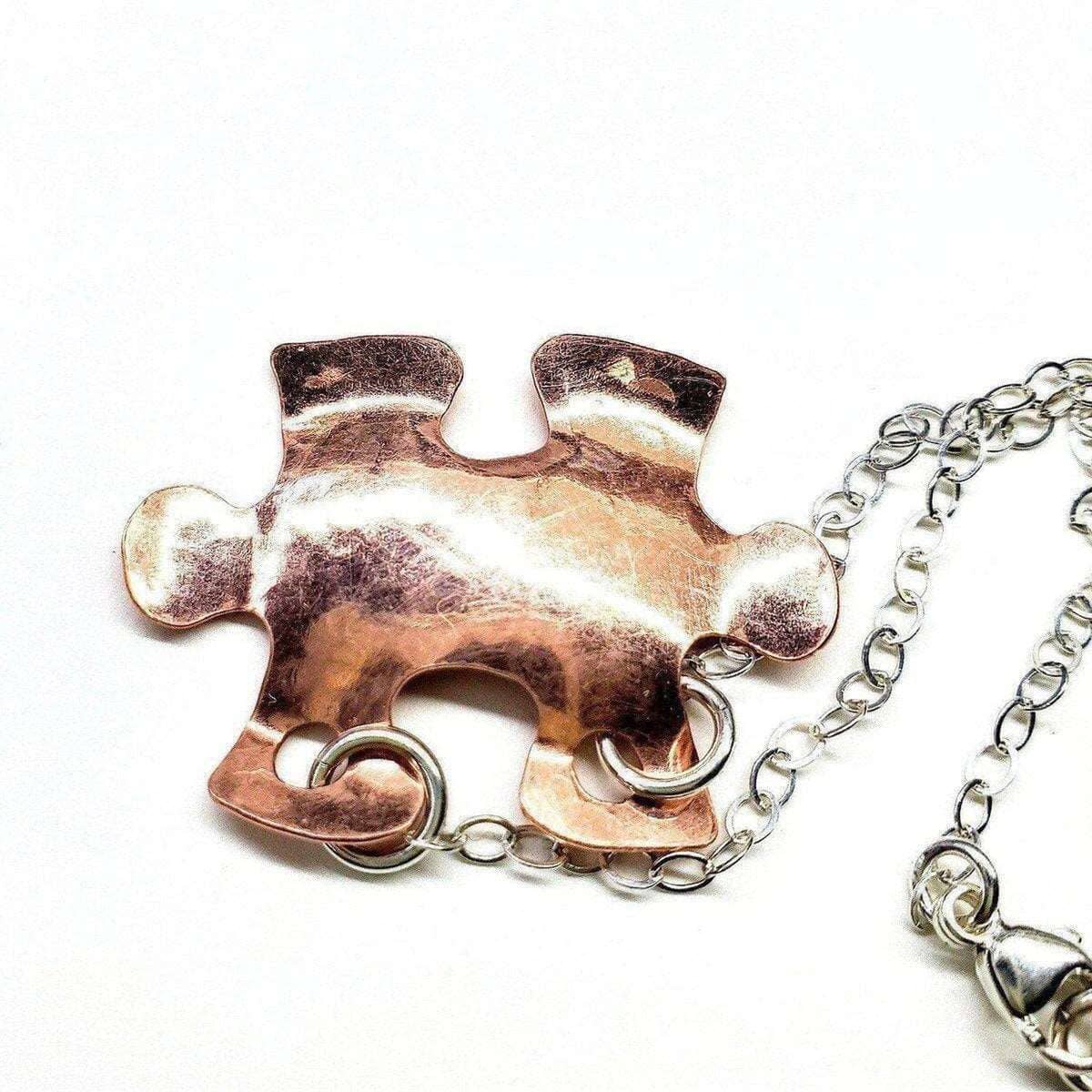 Handmade Hammered Copper Puzzle Piece Necklace by Alexa Martha Designs