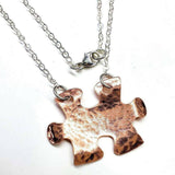 Handmade Hammered Copper Puzzle Piece Necklace by Alexa Martha Designs