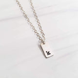 Initial Tiny Rectangle Tag Necklace by Salt and Sparkle