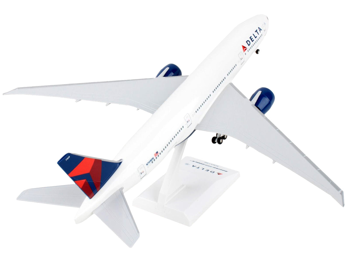 Boeing 777-200 Commercial Aircraft with Landing Gear "Delta Air Lines" (N709DN) White with Blue and Red Tail (Snap-Fit) 1/200 Plastic Model by Skymarks