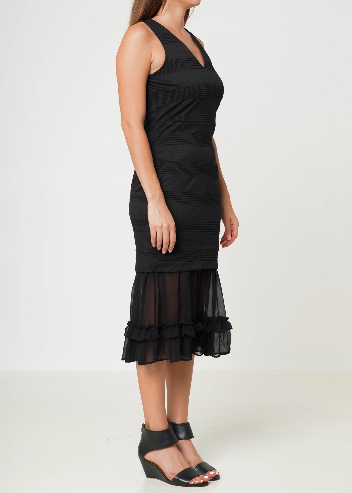 Sleeveless V-neck Sheer Ruffle Hem Bodycon Dress In Black by Shop at Konus