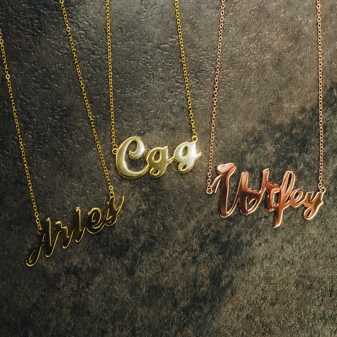 Custom Nameplate Pendant by Custom Gold Grillz