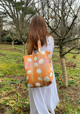 Tote Bag: Cream Flowers on Orange by India & Purry