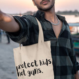 Protect Kids Not Guns | Tote Bag by The Happy Givers