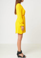 Smocked Bell Sleeve Wrap Dress in Yellow by Shop at Konus