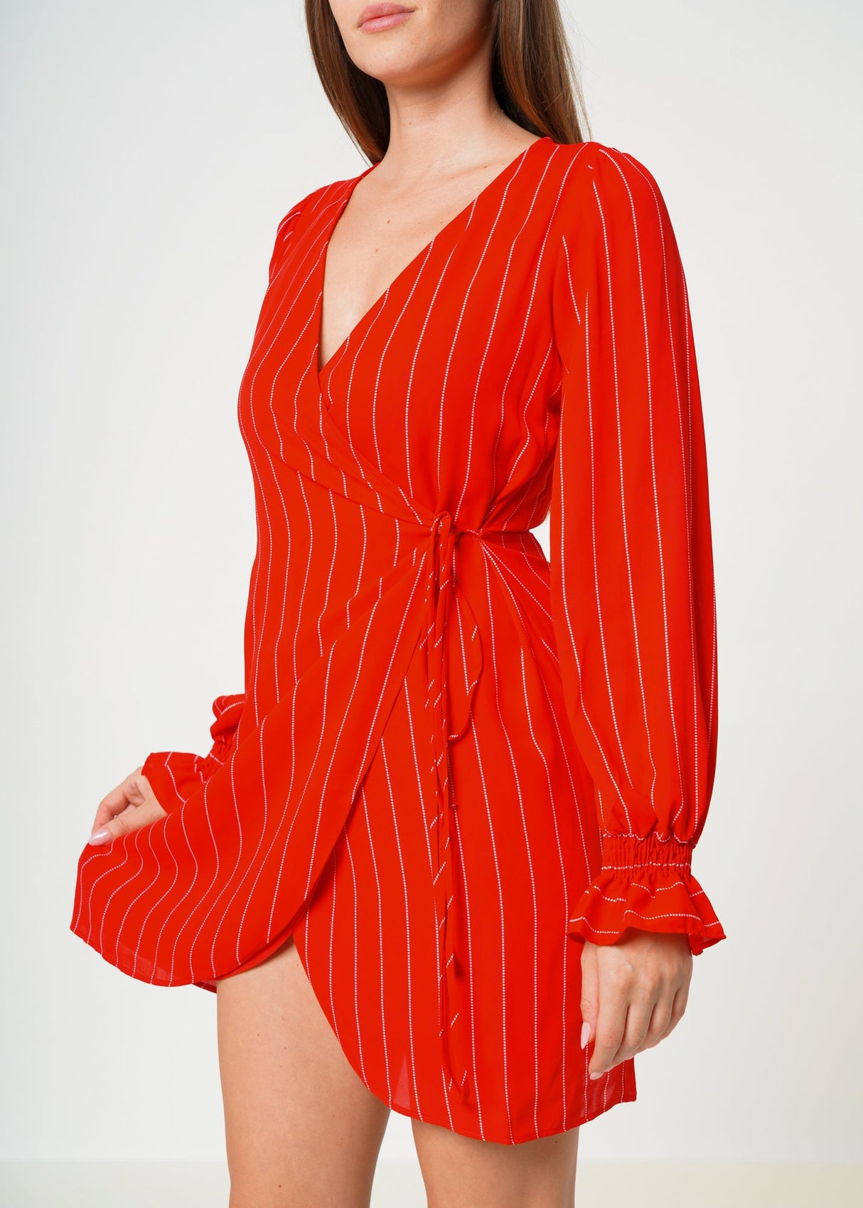 Smocked Bell Sleeve Wrap Dress in Red by Shop at Konus