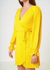 Smocked Bell Sleeve Wrap Dress in Yellow by Shop at Konus