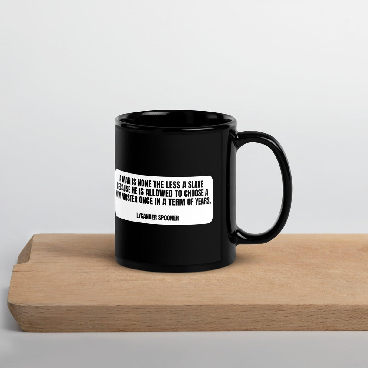 A man is none the less a slave... - Lysander Spooner Black Glossy Mug by Proud Libertarian - Vysn