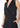 V-Neck Sleeveless Romper In Black by Shop at Konus - Vysn